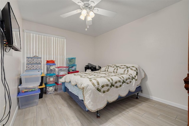4357 Tahitian Gardens Cir Unit B, Holiday, FL 34691 - bedroom with wood finish floors and ceiling fan