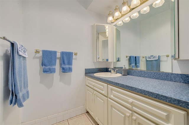 4357 Tahitian Gardens Cir Unit B, Holiday, FL 34691 - bathroom featuring tile patterned flooring and vanity