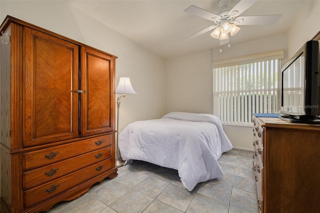 4357 Tahitian Gardens Cir Unit B, Holiday, FL 34691 - bedroom featuring light tile patterned flooring and ceiling fan