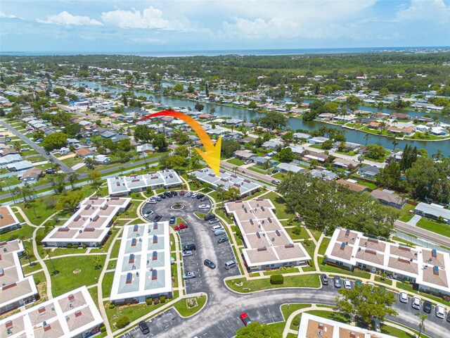 4357 Tahitian Gardens Cir Unit B, Holiday, FL 34691 - aerial overview of property's location featuring a large body of water and nearby suburban area