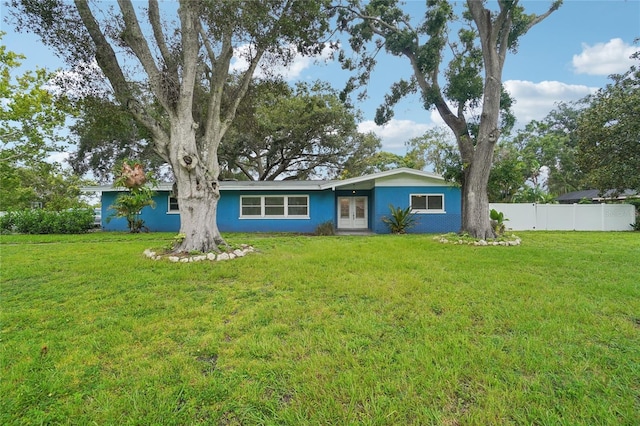1712 Robin Hood Ln, Clearwater, FL 33764 - ranch-style house featuring french doors and stucco siding