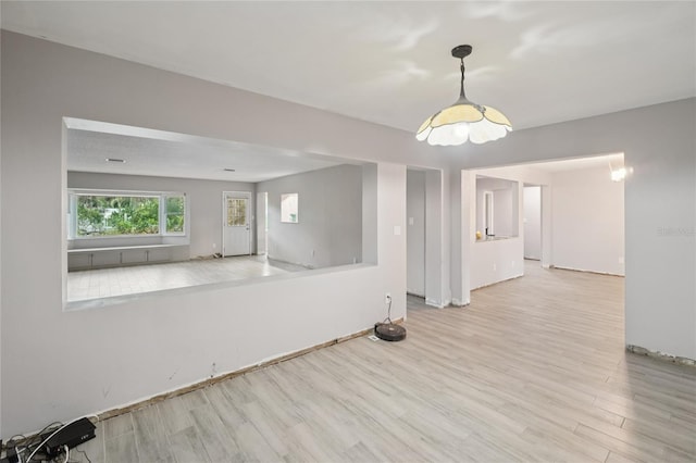 1712 Robin Hood Ln, Clearwater, FL 33764 - unfurnished room with wood finished floors and baseboards