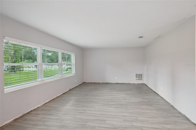 1712 Robin Hood Ln, Clearwater, FL 33764 - spare room with wood finished floors