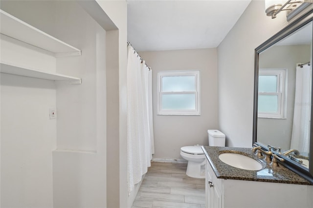 1712 Robin Hood Ln, Clearwater, FL 33764 - full bath with vanity, a shower with curtain, and wood finished floors