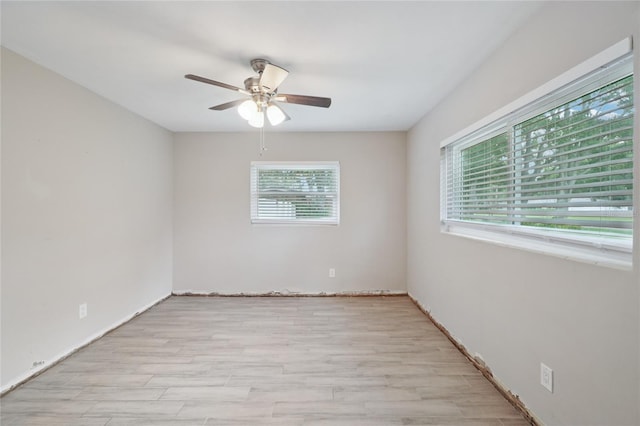 1712 Robin Hood Ln, Clearwater, FL 33764 - unfurnished room featuring ceiling fan and light wood-style floors