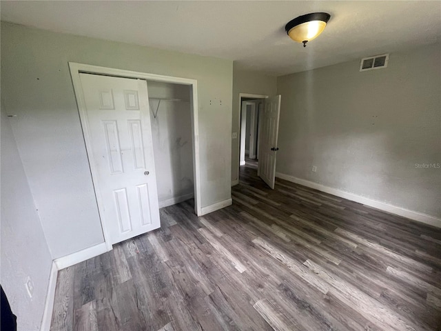 1225 Nemeth St, Auburndale, FL 33823 - unfurnished bedroom with wood finished floors and a closet