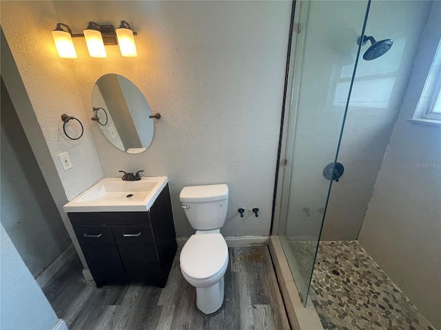 1225 Nemeth St, Auburndale, FL 33823 - bathroom featuring wood finished floors, a walk in shower, and vanity