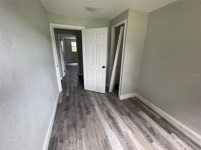 1225 Nemeth St, Auburndale, FL 33823 - hall featuring baseboards and wood finished floors