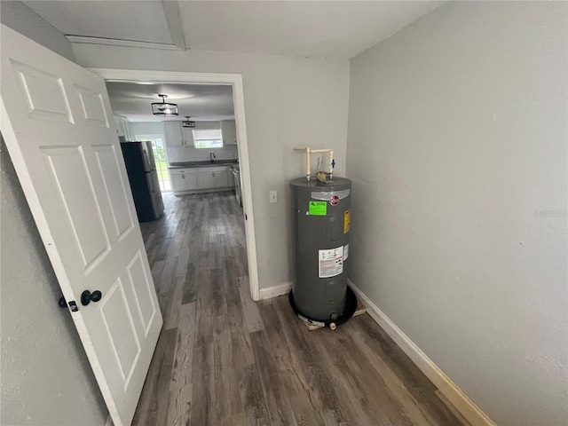 1225 Nemeth St, Auburndale, FL 33823 - utility room featuring water heater