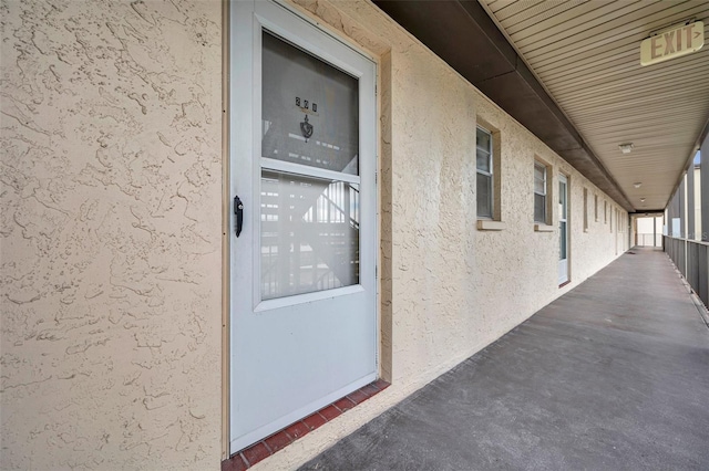 5245 Amulet Dr Unit 201, New Port Richey, FL 34652 - property entrance with stucco siding