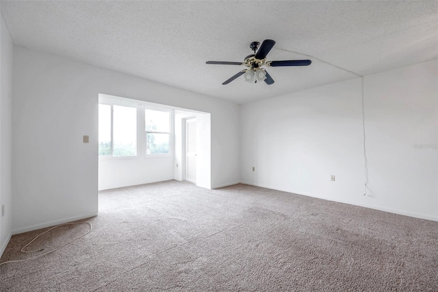 5245 Amulet Dr Unit 201, New Port Richey, FL 34652 - carpeted empty room featuring a textured ceiling and ceiling fan