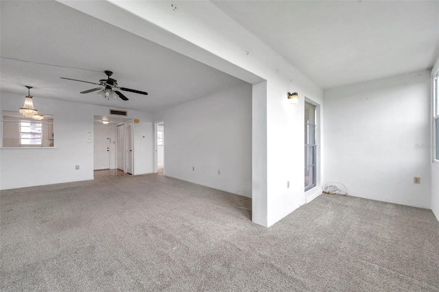 5245 Amulet Dr Unit 201, New Port Richey, FL 34652 - spare room featuring carpet flooring and a ceiling fan