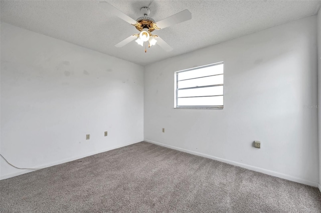 5245 Amulet Dr Unit 201, New Port Richey, FL 34652 - carpeted empty room with a textured ceiling and ceiling fan