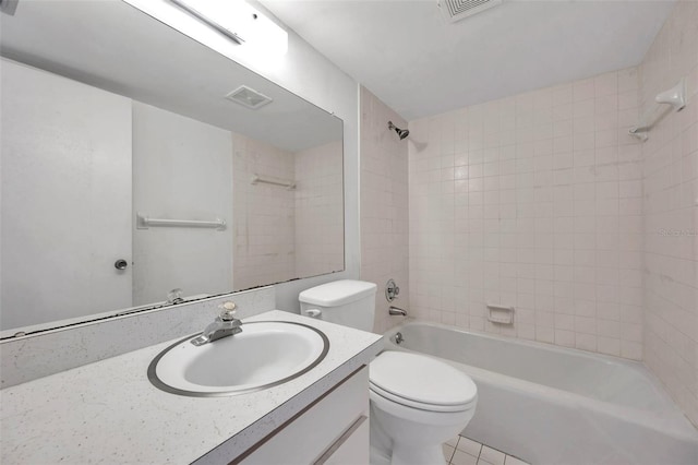 5245 Amulet Dr Unit 201, New Port Richey, FL 34652 - bathroom featuring vanity, tub / shower combination, and tile patterned flooring