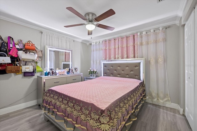 1712 W Atkinson St, Tampa, FL 33604 - bedroom featuring ornamental molding, wood finished floors, and ceiling fan