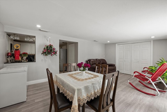 1712 W Atkinson St, Tampa, FL 33604 - dining room featuring wood finished floors and recessed lighting