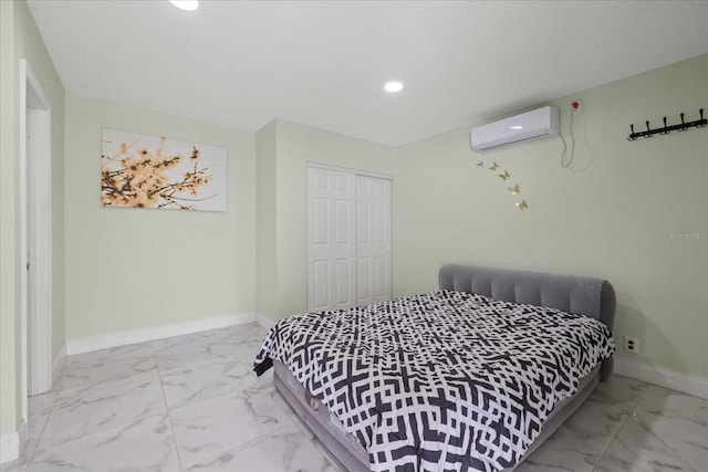1712 W Atkinson St, Tampa, FL 33604 - bedroom featuring an AC wall unit, marble look tile flooring, recessed lighting, and a closet