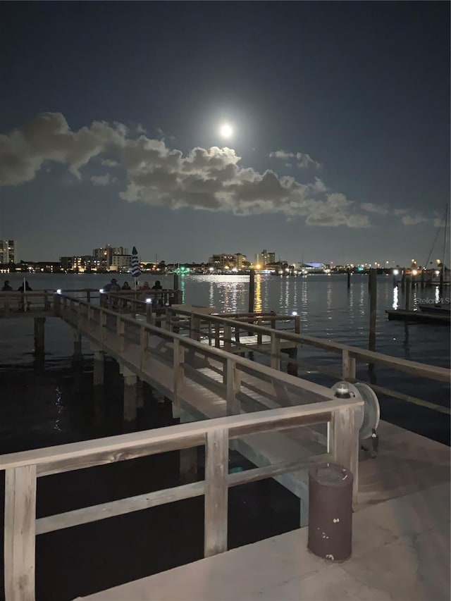 483 E Shore Dr Unit B4, Clearwater Beach, FL 33767 - dock area featuring a water view and a view of city lights