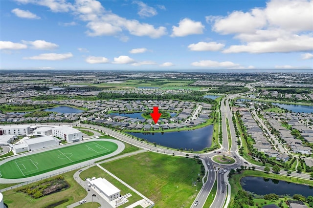 5434 Silver Sun Dr, Apollo Beach, FL 33572 - aerial view of property and surrounding area with a nearby body of water and nearby suburban area