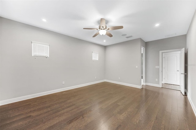 5434 Silver Sun Dr, Apollo Beach, FL 33572 - empty room featuring a ceiling fan, dark wood-style floors, and recessed lighting