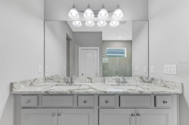5434 Silver Sun Dr, Apollo Beach, FL 33572 - bathroom with double vanity and a tile shower