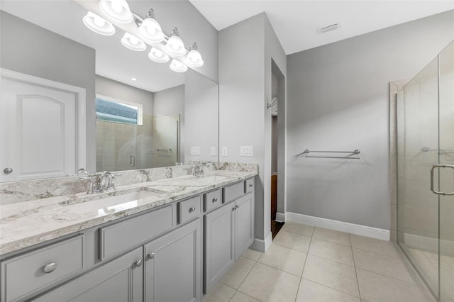 5434 Silver Sun Dr, Apollo Beach, FL 33572 - full bath featuring double vanity, a shower stall, and tile patterned flooring