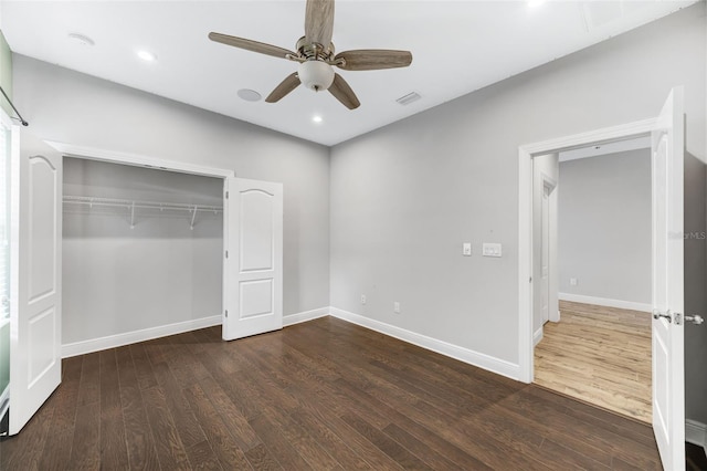 5434 Silver Sun Dr, Apollo Beach, FL 33572 - unfurnished bedroom featuring wood finished floors, a closet, a ceiling fan, and recessed lighting