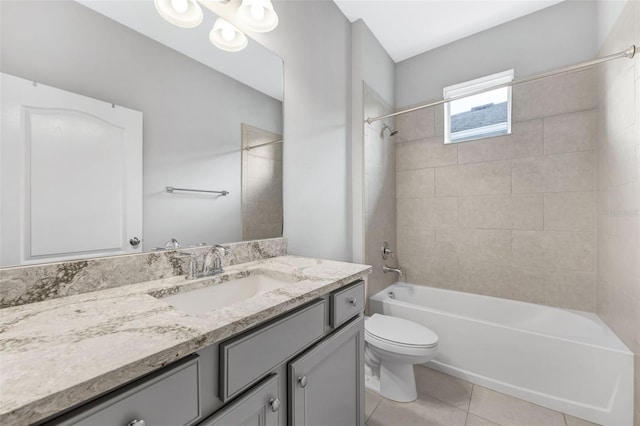 5434 Silver Sun Dr, Apollo Beach, FL 33572 - bathroom featuring vanity, shower / bath combination, and tile patterned flooring