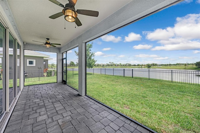 5434 Silver Sun Dr, Apollo Beach, FL 33572 - unfurnished sunroom with a water view and ceiling fan