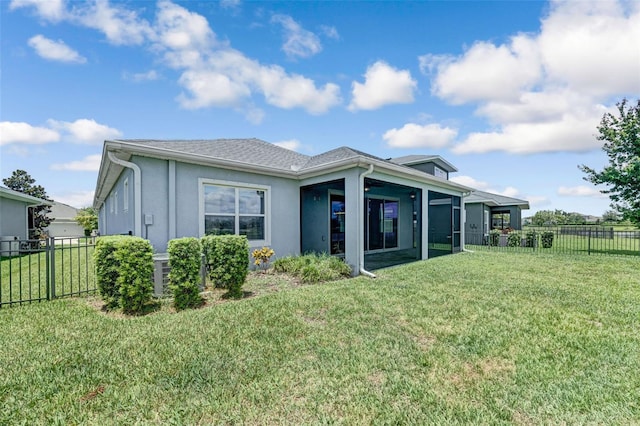 5434 Silver Sun Dr, Apollo Beach, FL 33572 - rear view of house featuring a fenced backyard and stucco siding