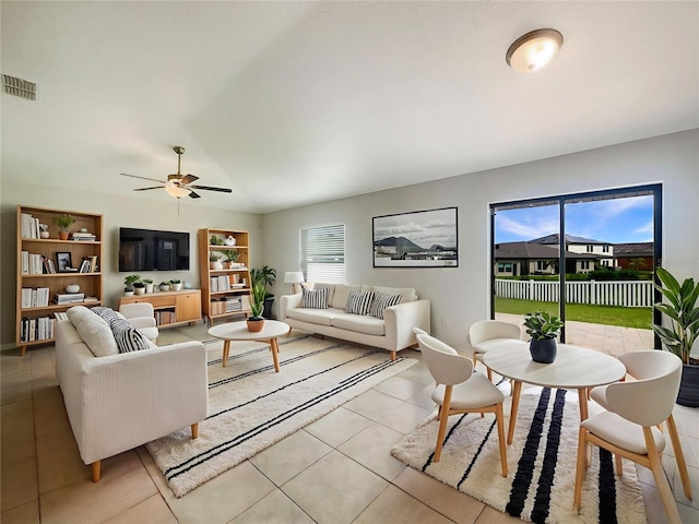 13008 Majestic Garden Ln, Riverview, FL 33579 - living room with ceiling fan and light tile patterned floors
