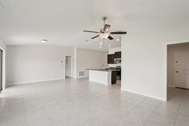 13008 Majestic Garden Ln, Riverview, FL 33579 - unfurnished living room with a ceiling fan, light tile patterned floors, vaulted ceiling, and recessed lighting