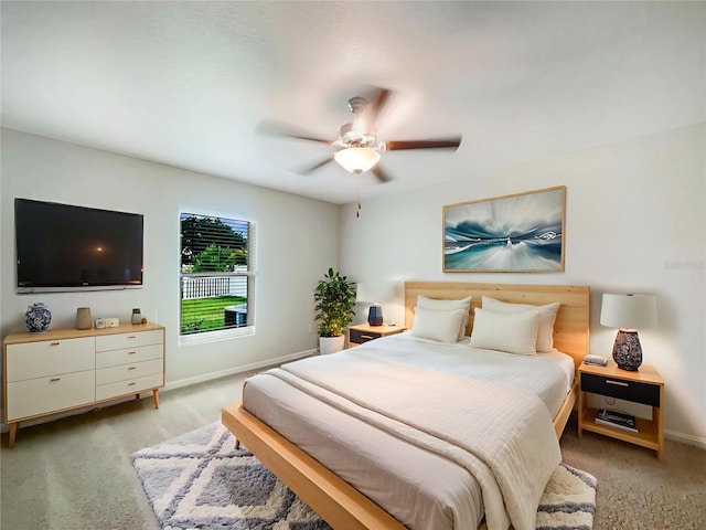 13008 Majestic Garden Ln, Riverview, FL 33579 - bedroom with light carpet and ceiling fan