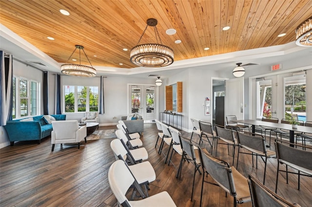 13008 Majestic Garden Ln, Riverview, FL 33579 - dining room with wood ceiling, a tray ceiling, recessed lighting, hardwood / wood-style flooring, and french doors