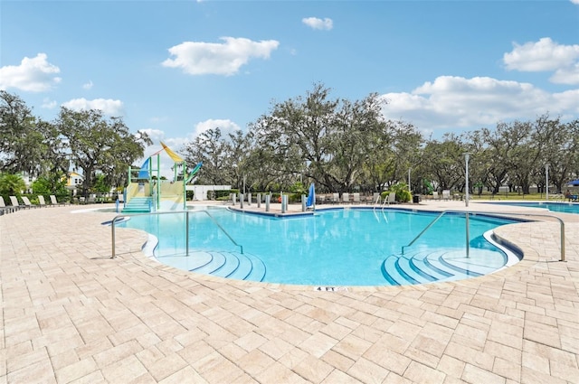 13008 Majestic Garden Ln, Riverview, FL 33579 - community pool with a patio area