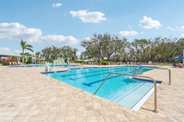 13008 Majestic Garden Ln, Riverview, FL 33579 - community pool featuring a patio area
