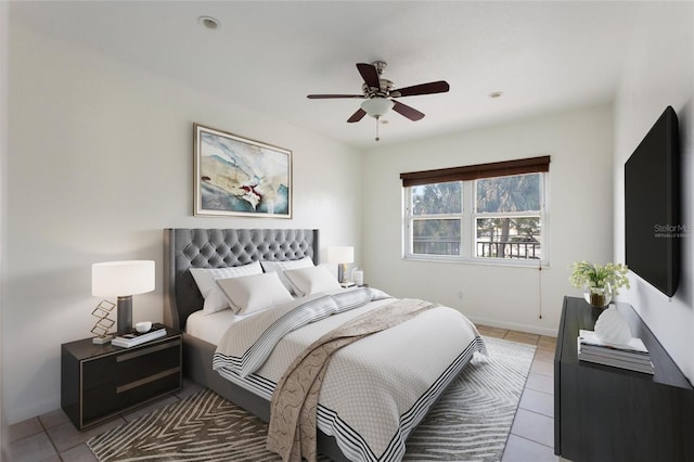 3753 46th Ave S Unit 10, Saint Petersburg, FL 33711 - bedroom with light tile patterned floors and ceiling fan