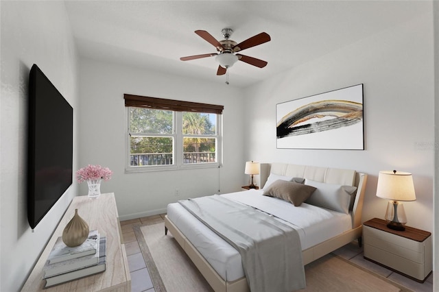 3753 46th Ave S Unit 10, Saint Petersburg, FL 33711 - bedroom featuring a ceiling fan and baseboards