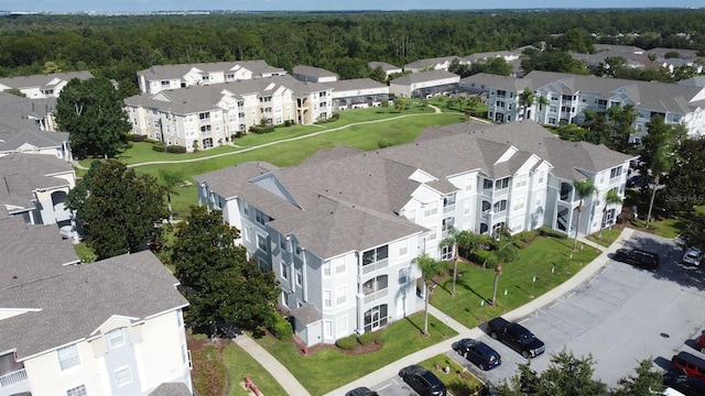 2300 Butterfly Palm Way Unit 204, Kissimmee, FL 34747 - bird's eye view of a forest and apartment complex