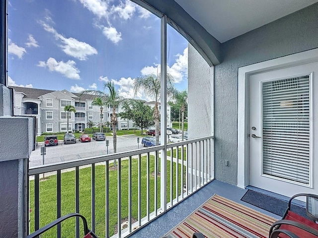 2300 Butterfly Palm Way Unit 204, Kissimmee, FL 34747 - balcony featuring a residential view