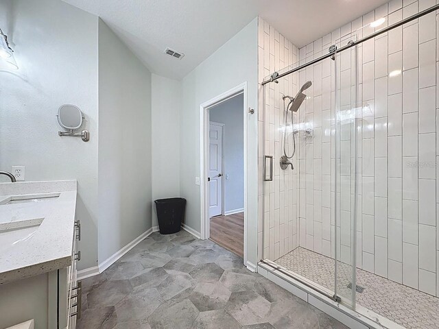 2300 Butterfly Palm Way Unit 204, Kissimmee, FL 34747 - full bath with a stall shower and double vanity