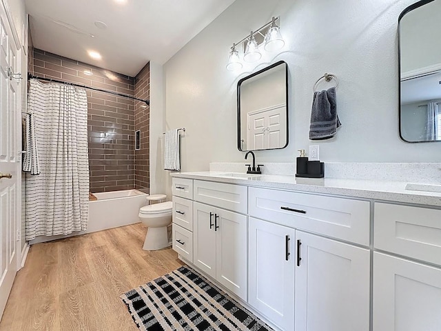 2300 Butterfly Palm Way Unit 204, Kissimmee, FL 34747 - full bathroom with vanity, shower / tub combo, and wood finished floors