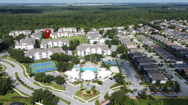 2300 Butterfly Palm Way Unit 204, Kissimmee, FL 34747 - aerial view of property's location with a heavily wooded area