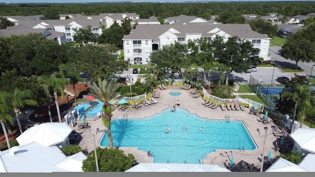 2300 Butterfly Palm Way Unit 204, Kissimmee, FL 34747 - community pool featuring a residential view