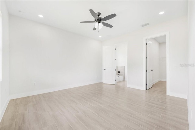 437 Mercedes Ct, Lehigh Acres, FL 33972 - empty room featuring ceiling fan, light wood-type flooring, and recessed lighting