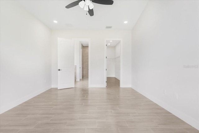 437 Mercedes Ct, Lehigh Acres, FL 33972 - spare room featuring ceiling fan, recessed lighting, and light wood-type flooring
