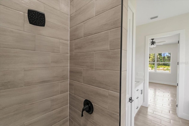 437 Mercedes Ct, Lehigh Acres, FL 33972 - full bathroom featuring a tile shower