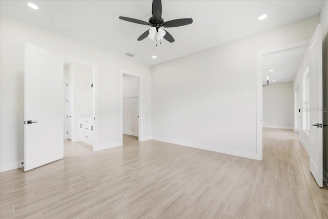 437 Mercedes Ct, Lehigh Acres, FL 33972 - unfurnished room with a ceiling fan and light wood-type flooring