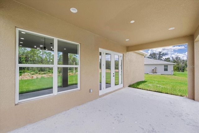437 Mercedes Ct, Lehigh Acres, FL 33972 - view of patio / terrace with french doors