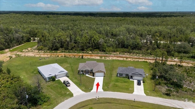 437 Mercedes Ct, Lehigh Acres, FL 33972 - bird's eye view of a heavily wooded area